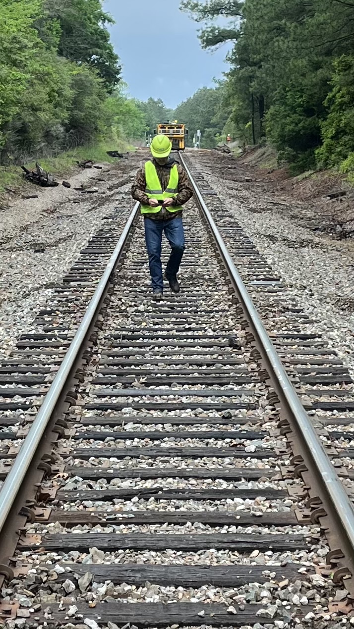 CEO Greg Janson walking the tracks on a recent Triton Ties install.